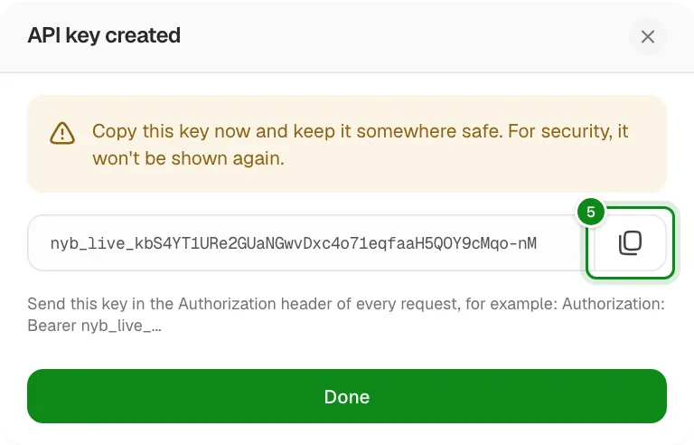 The new API key, shown once, with a copy button.