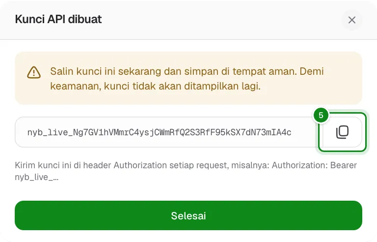 Kunci API baru yang ditampilkan sekali dengan tombol salin.